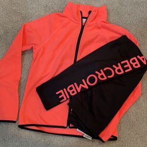 Abercrombie Kids- girls black and Orange neon active leggins and zip up top.
